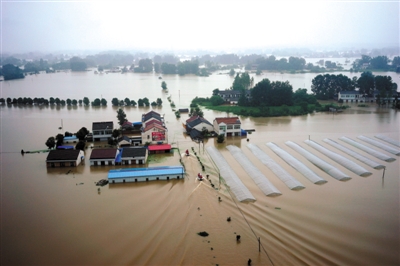 追问此次洪灾8个焦点问题 台风会加重灾情吗