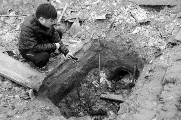  清代将军墓现盗坑 (图) 拆迁村民:不愿多事,就当