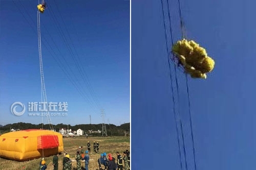  男子玩滑翔伞遇险 (组图)惊魂画面曝光 命悬11万